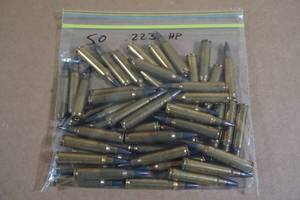 lot 105 image: 50 Loose .223 Rem HP Ammo