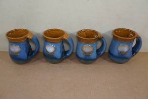 lot 24 image: 4 Cape Shore Beach House Shell Handwarmer Mugs