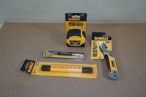lot 61 image: DeWalt Tools - Utility Knife, Tape Measure, Drive Guide, and Socket Rail