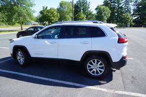lot 1 image: 2016 Jeep Cherokee Limited SUV - 76,980 Miles