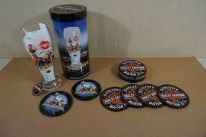 lot 193 image: Harley Davidson Dottie 22oz Beer Glass and Coasters in a Tin