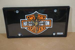 lot 204 image: Harley Davidson License Plate Clock