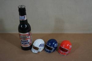 lot 238 image: Vintage BudBud LightBud Dry Mini Helmets, Bud Light Lighter