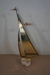 lot 253 image: Metal Sailboat with Rock Base