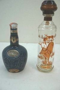 lot 71 image: cabin Still Sportsman glass whiskey decanter and Royal Salute whiskey bottle
