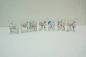 lot 76 image: Walt Disney collectable glasses