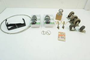 lot 123 image: Atlas door knobs, casters, light brackets and more