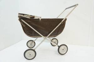 lot 141 image: vintage nanny stroller toy