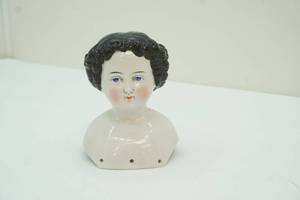 lot 183 image: doll head
