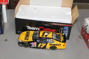lot 884 image: Matt Kenseth #17 DeWalt 2003 Ford Taurus Stock Car 124-Scale 1 of 10800 Limited Edition Diecast Adult Collectible  by  Team Caliber