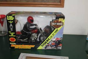 lot 927 image: Tyco 6.0V Jet Turbo Harley-Davidson RC Motorcycle (in original packaging)