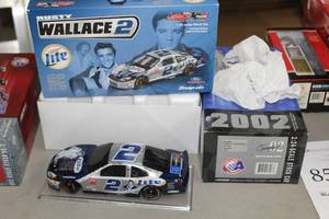 lot 888 image: Rusty Wallace #2 Miller Lite  Elvis 25th Anniversary 2003 Ford Taurus Stock Car 124-Scale Limited Edition Diecast Adult Collectible  by  Action Racing Collectibles