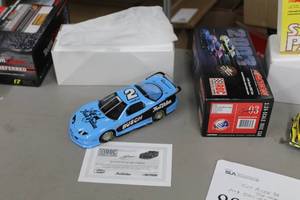 lot 889 image: Kurt Busch #2 True Value  IROC Talladega Win  Autographed 2003 Pontiac Firebird IROC Stock Car 124-Scale 1 of 5004 Special Autograph Edition Diecast Adult Collectible  by  Action Racing Collectibles