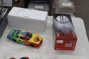 lot 880 image: Jeff Gordon #24 Foundation  Sesame Street 2002 Chevrolet Monte Carlo Stock Car 124-Scale 1 of 26844 Limited Edition Diecast Adult Collectible  by  Action Racing Collectibles