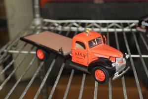 lot 973 image: Ajax Towing Service 1941 Chevrolet Flatbed Truck Collectible