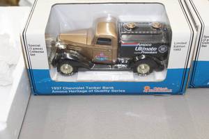 lot 858 image: Amoco 1937 Chevrolet Tanker 124-Scale Heritage Of Quality Series Limited Edition Diecast Metal Locking Coin Bank