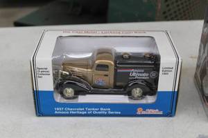 lot 907 image: Amoco 1937 Chevrolet Tanker 124-Scale Heritage Of Quality Series Limited Edition Diecast Metal Locking Coin Bank
