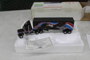lot 865 image: Harley-Davidson Kenworth Tractor Trailer & Sleeper Cab 164-Scale Diecast Collectible  by  Matchbox Collectibles