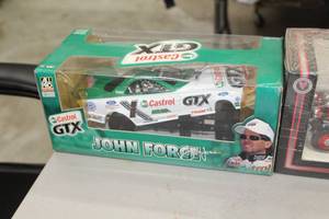 lot 913 image: John Force Signed Castrol GTX 2002 Ford Mustang Funny Car 124-Scale Limited Edition Adult Collectible  by  Action Racing Collectibles