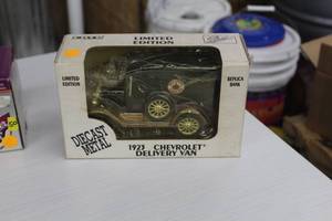 lot 912 image: 1923 Chevrolet Delivery Van 124-Scale Limited Edition Diecast Replica Bank  by  Ertl