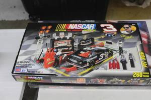 lot 821 image: LEGO Dale Earnhardt 129 Scale Pit Row Building Set 260-piece (in original packaging)