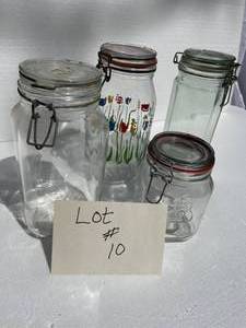 lot 10 image: Vintage glass jars with lids that snap in place