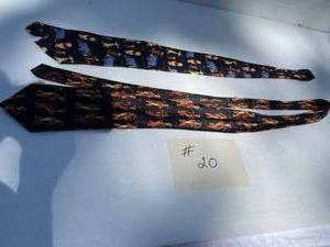 lot 20 image: Disney Silk Black Neck Ties With Tigger On 1, Other is black With Pooh, Piglet, Eeyore