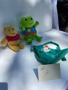 lot 21 image: Talking Winnie The Pooh Bear,  The Frog Talks When Pressing HandsFeetTummy, NY Back Pack