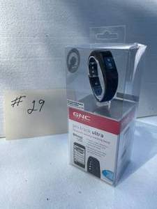lot 29 image: NEW GNC Pro-TrackerUltra Blue Tooth Activity Tracking Band Tracks All Activities And Quality Of Sleep. Wirelessly Syncs To Cell Phones & Portable Devices