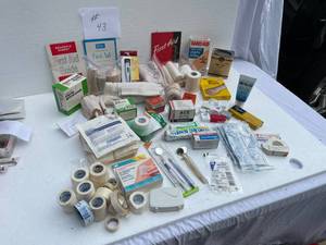 lot 43 image: Large Lot Of First Aid Items Pads, Tape, Gauze, Bandages, Braces, Floss & Much More
