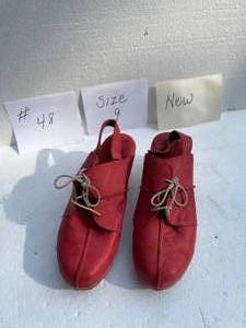 lot 48 image: Red Leather Slip On Shoes By Sergio Tomani Size 9. Wood Sole. 1.5 Wood Heel.