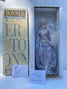 lot 81 image: Porcelain Doll By Tonner Doll Co. Violet Color Gown, Beaded Bias. Never Out Of Original Box. 17 Tall