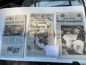 lot 124 image: MN. Twins World Champions 10261987 High Lights. (Paper Yellowing)