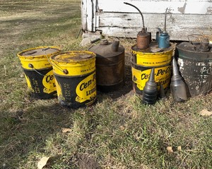 lot 73 image: Lubricant Tins