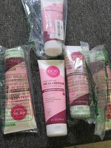 lot 411 image: 5  8 fl oz bottles of EOS body cre...