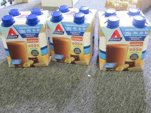 lot 413 image: 3 packs of 4 bottles of atkins choc...