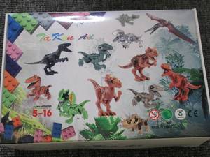 lot 435 image: new dino lego type toys...