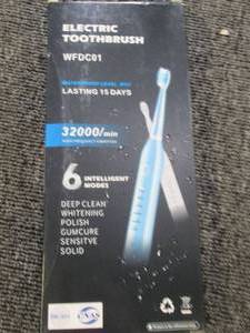 lot 447 image: new electric toothbrush ...