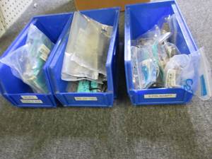 lot 553 image: 3 blue bins , computer plugs, zip t...