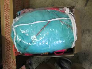 lot 563 image: box of girls clothes , toys and mor...