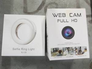 lot 113 image: full HD webcam and a selfie ring ...