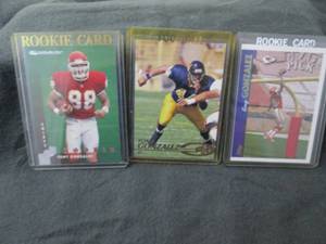 8. 3 Tony Gonzalez Rookie Cards...