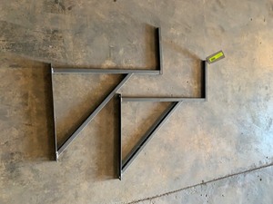 lot 1005 image: Storage Brackets