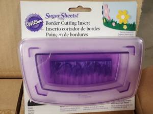 lot 9 image: Pallet of 1440 New Wilton Sugar Sheets Cutting Insert - Grass - Retail value $11,649
