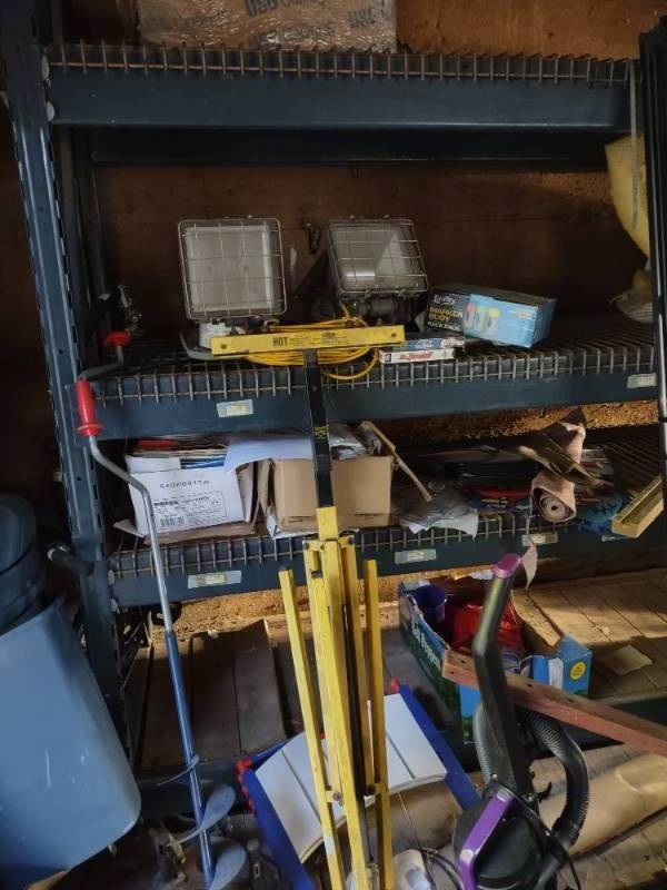 lot 003 image: Abandonded Stored Goods  ENTIRE CONTENTS  of a 30 x 30 foot garage  Buyer MUST REMOVE entire contents within one week of the auction close