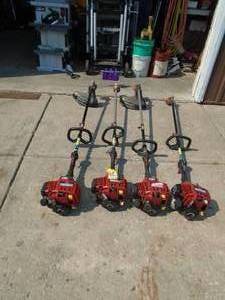 Lot of 4 gas weed trimmers. Probably need carb adjustment. As shown.