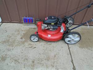 Yard Machine push mower. Used condition. Tested & works. As shown.