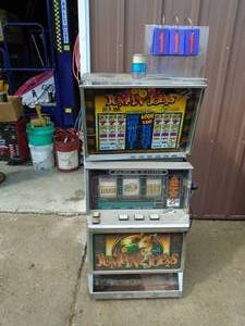 Jumping Joeys slot machine for parts or repair. As shown.