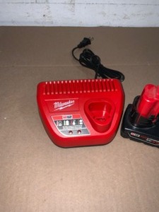 Milwaukee M12 RED Lithium XC3.0 Battery & Charger. See Pictures