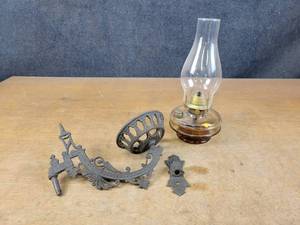 lot 1174 image: Antique Cast Iron Wall Sconce Oil Lamp Holder w Lamp (Marked Patent April 11, 1877)  - NO SHIPPING